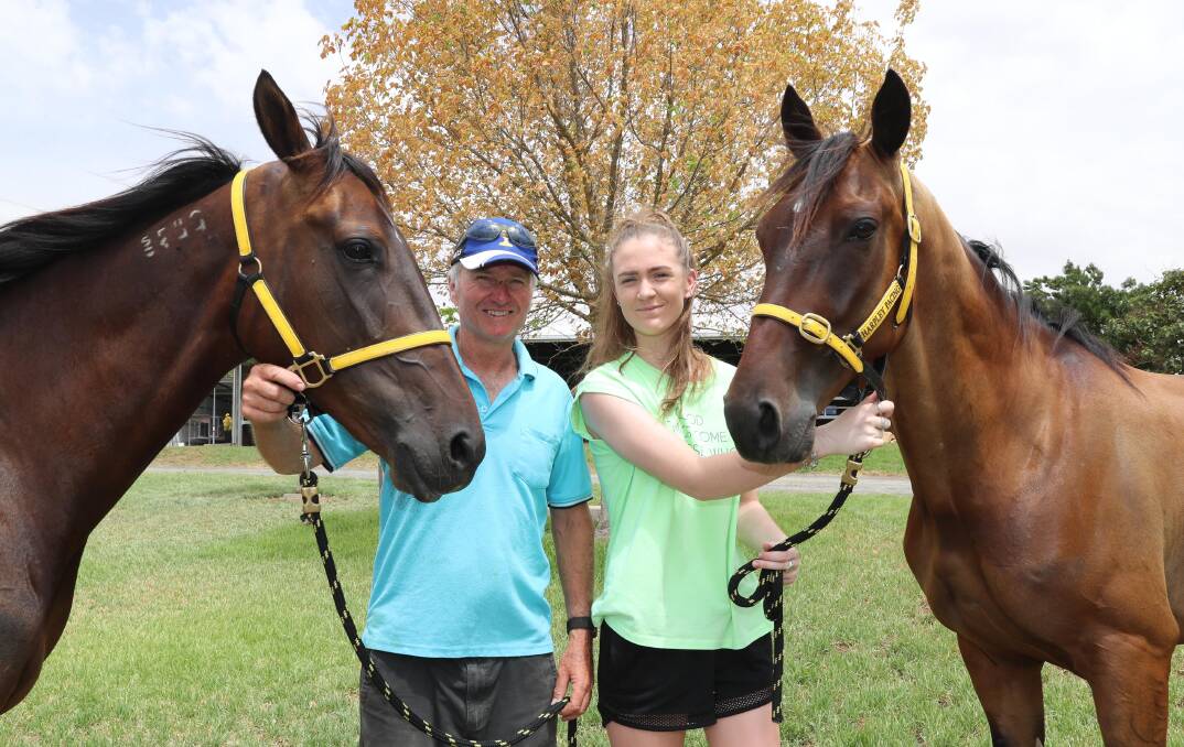 CUP HOPE: Bruce Harpley is looking for Rubies For Tash and Roll One Over, pictured with daughter Brooke, to qualify through to the Junee Pacers Cup next Sunday. Three heats will be run on Saturday. Picture: Les Smith