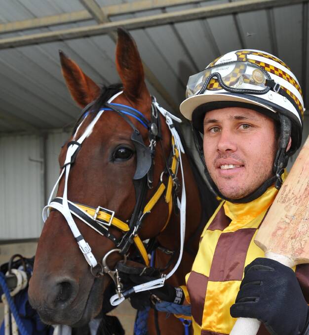 Grant Forrest with Iconic Legend, who is one of his three horses engaged at Albury on Saturday night.