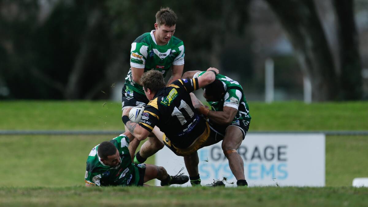 Jack Schubert is brought down by the Albury defence in Gundagai's win at Greenfield Park on Saturday. Picture by The Border Mail