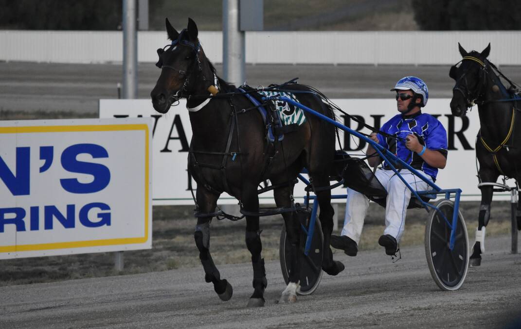 WINNING RETURN: Dean Cernovskis brings back Adira after her group three success at Riverina Paceway on Friday. Picture: Courtney Rees