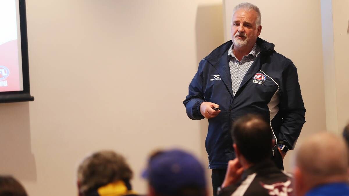 DIFFERENT APPROACH: Independent consultant David Burgess delivers his AFL Riverina Competitions Review to clubs at The Rules Club in Wagga on Sunday.