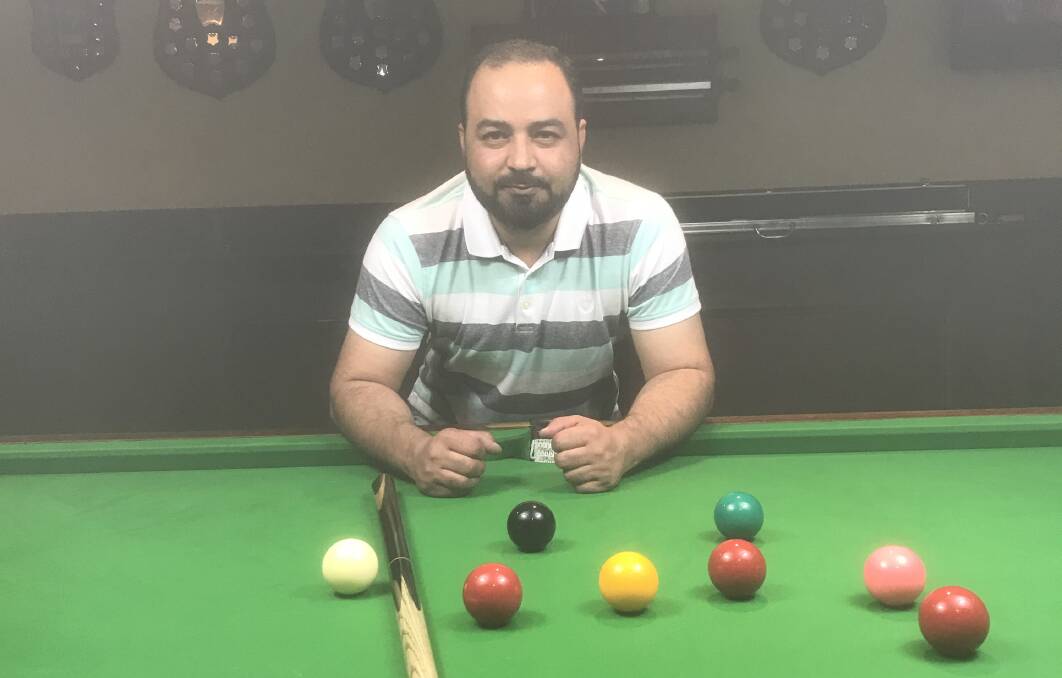 COMEBACK KING: Hamid Khan reeled off the last three games to take a tight win over John Raczkowski in the A grade singles title at Wagga RSL Club.