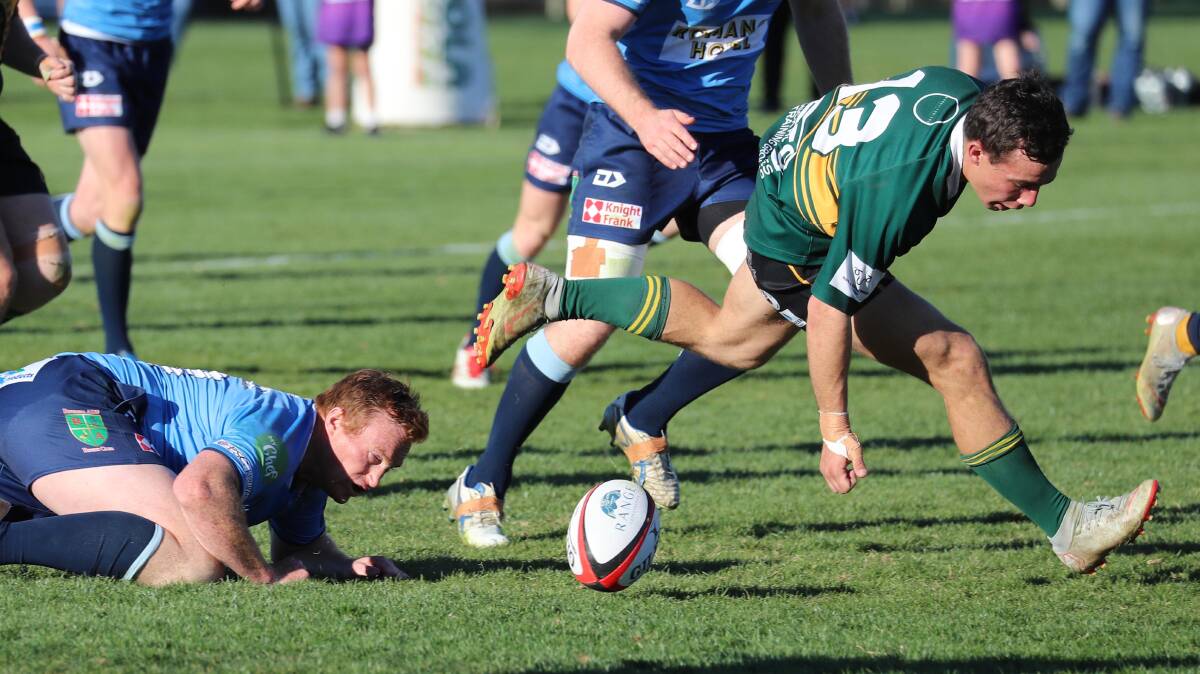 SLIPPING AWAY: Ag College centre Lochie Ramm can't swoop on a loose ball late in Ag College's loss to Waratahs in the Southern Inland grand final at Conolly Rugby Complex on Saturday. Picture: Les Smith