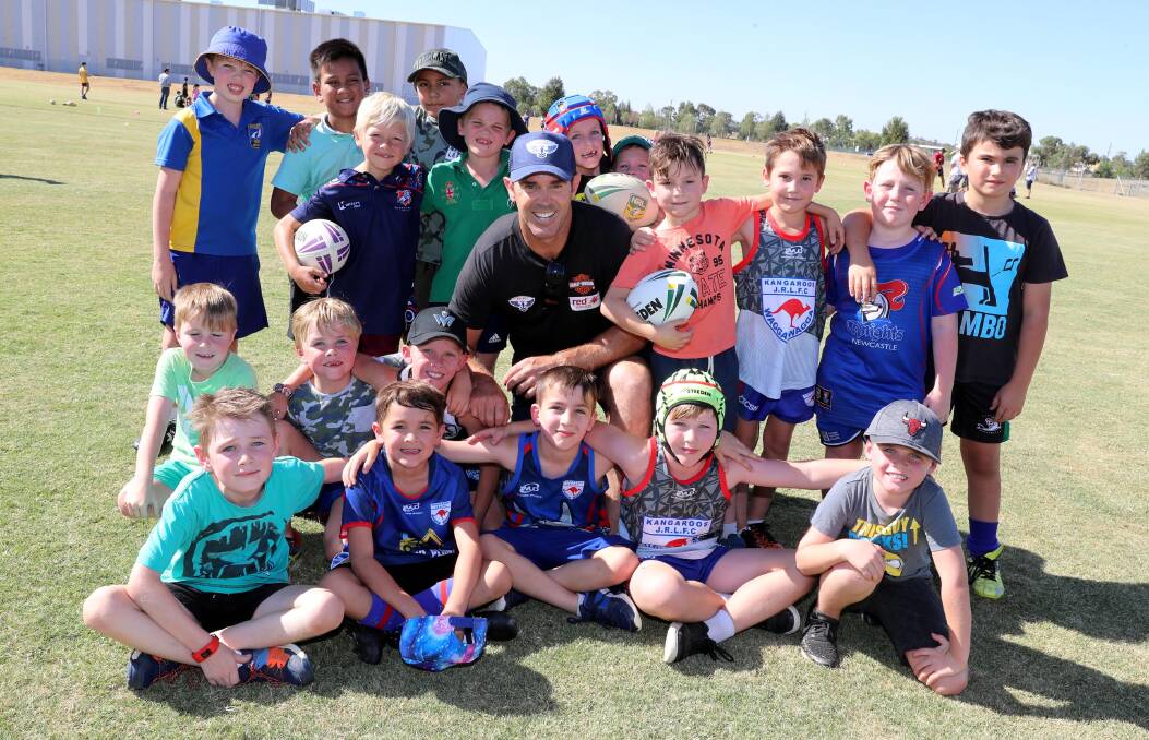 KING OF THE KIDS: NSW State of Origin coach Brad Fittler with some of the young rugby league players at a clinic at Parramore Park on Thursday as part of the Hogs For Homeless tour. Picture: Les Smith