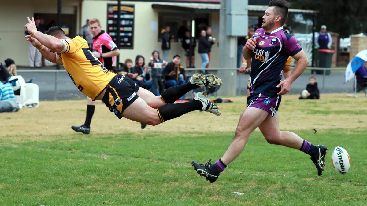 TRY TIME: Damian Willis celebrates after scoring a remarkable try to kick off Gundagai's win over Southcity on Sunday. Picture: Les Smith
