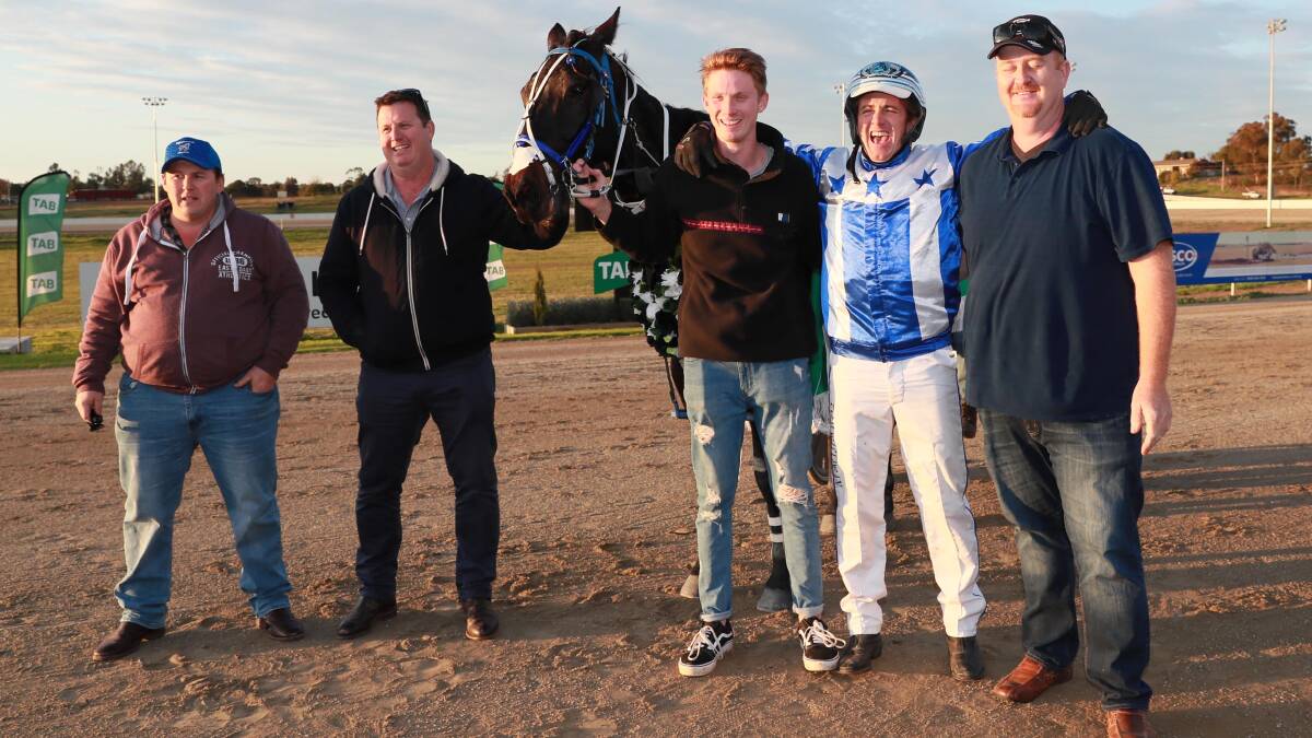 Tom Gilligan and the McPherson family celebrate's Rocky Creed's group one victory. 