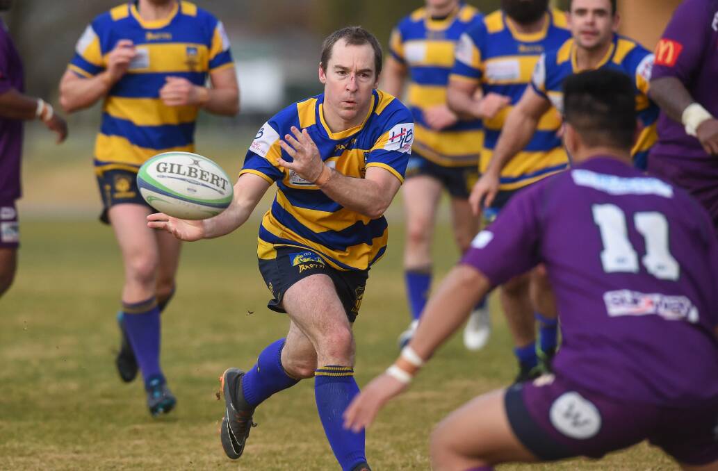 Benn Reid fires out a pass in Albury's win over Leeton on Saturday.