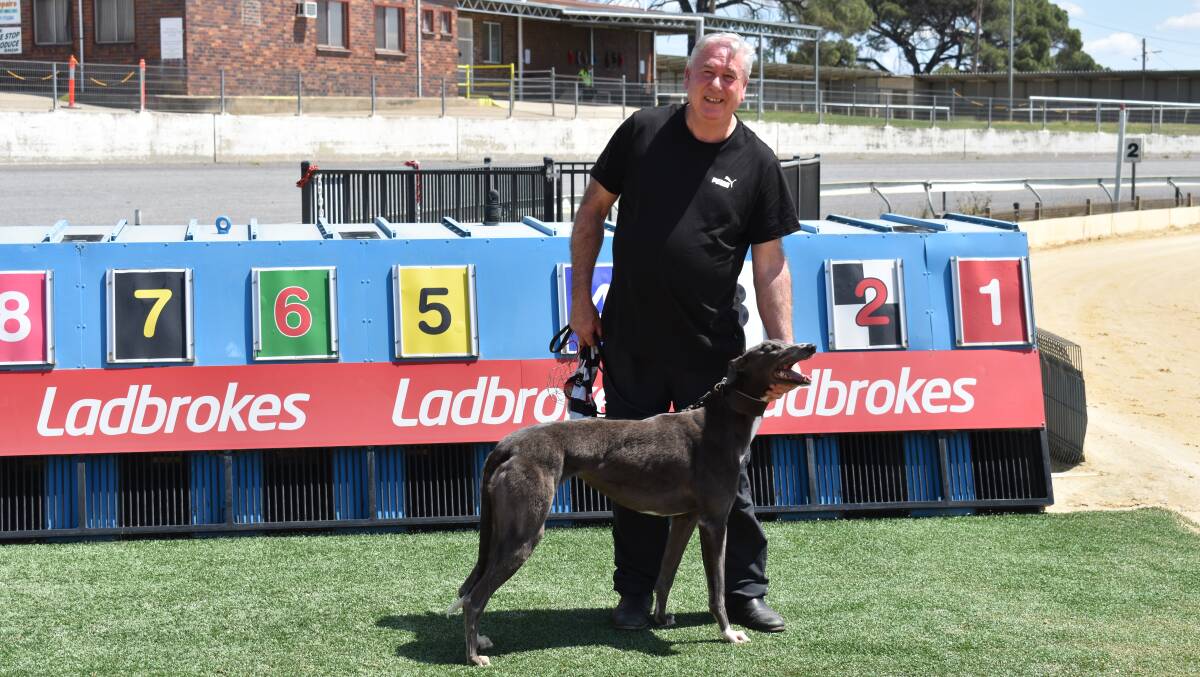 PICKING UP THE SPOILS: Andrew Mulrine celebrates Miss Key's win at Wagga on Friday. Picture: Courtney Rees