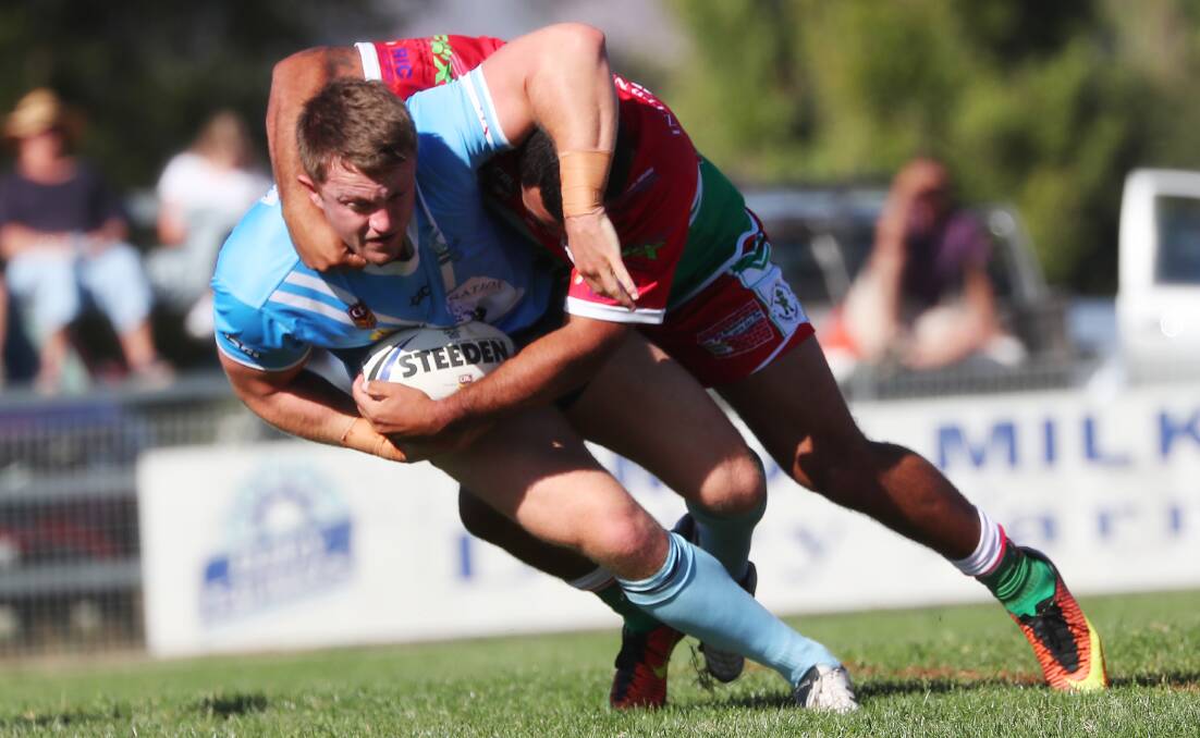 REP NOD: Zac Masters, pictured being tackled in the narrow win over Brothers on Sunday, has been named in the Country side to tour New Zealand later this year.