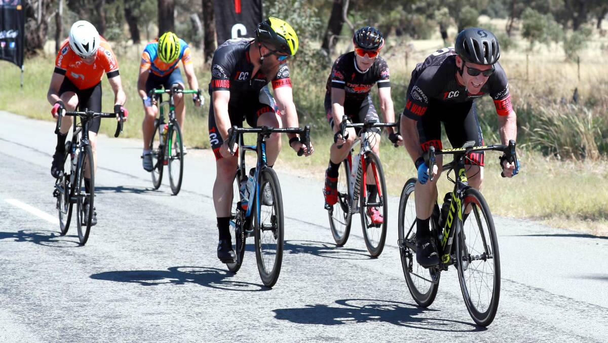WINNING EDGE: Peter Johnson powers his way to victory in the opening leg of the Tour de Riverina at Uranquinty on Sunday. Picture: Les Smith