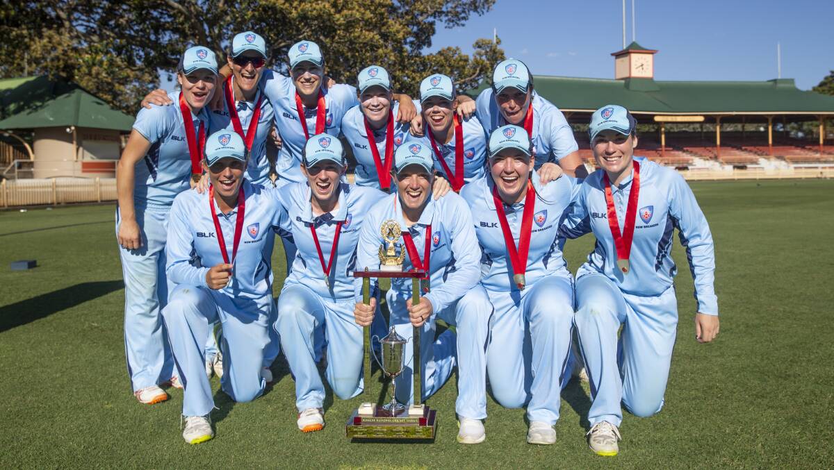 GLORIOUS RUN: Wagga's Rachel Trenaman (second from front right) celebrates NSW's WNCL title after the Breakers downed Queensland on Saturday.