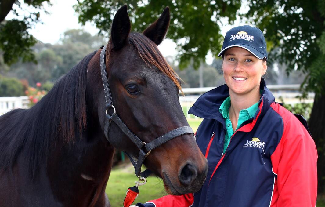 IN FORM: Padrisimo, pictured with Yirribee stablehand Nicole Solberg, is looking to make it a hat-trick of wins at Young on Friday. Picture: Les Smith