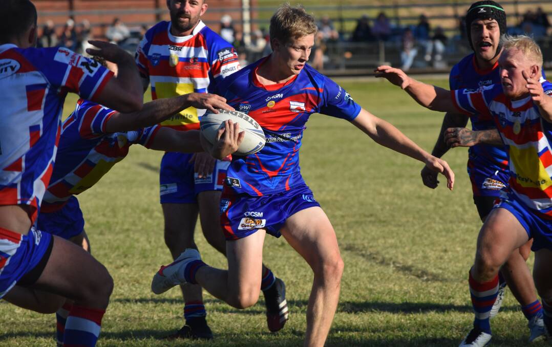 ON THE ATTACK: Jake Mascini tries to split the Young defence at Alfred Oval on Saturday. The fullback was denied a try to level things in the second half.