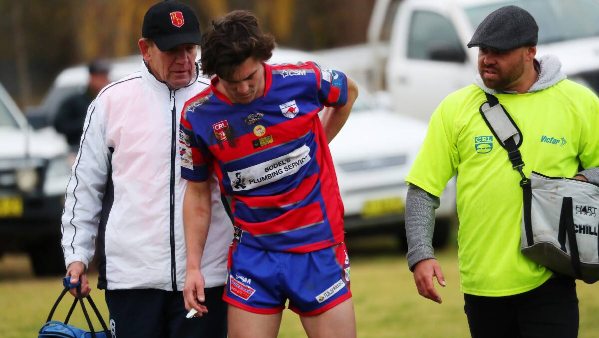 SIDELINED: Eddie Jackson feels his back as he comes off in Kangaroos loss to Junee on Saturday. Jackson has a fractured vertebrae and will miss the rest of the season.
