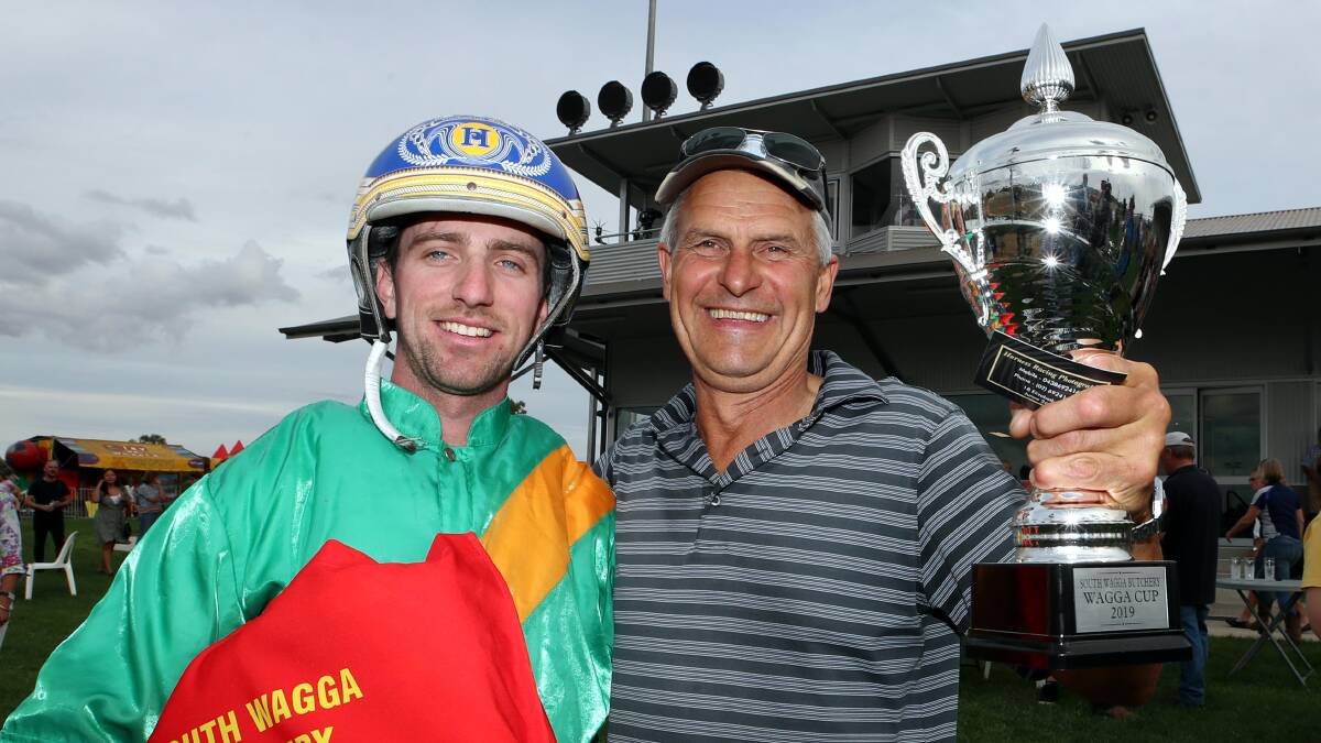 NEW TIMESLOT: Cameron Hart and Peter Trevor-Jones celebrate after Beetson's victory in the Wagga Pacers Cup in April. This season's feature race will be ran in May.