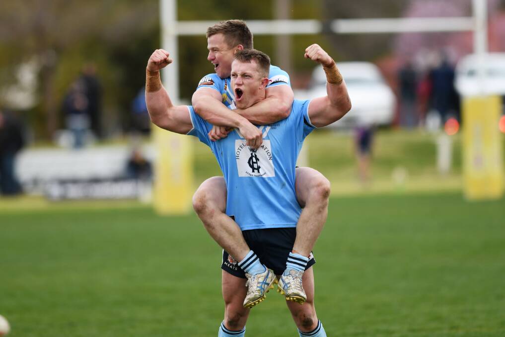 STREAK SNAPPED: Zac Masters and Ben Roddy celebrate as Tumut ending their 19-game losing run against Gundagai in the preliminary final at Harris Park on Sunday.