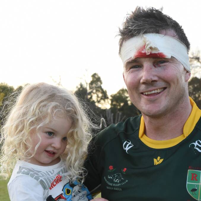 Sean Kearns, pictured with daughter Freya after Waratahs game at Kapooka earlier this year, has opened up about why he stopped playing football this year.