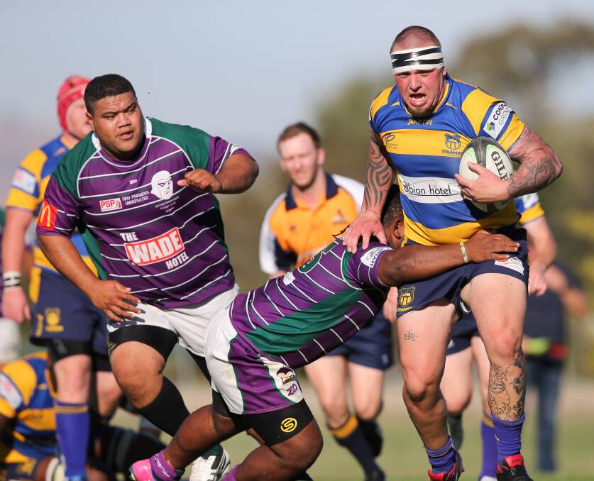 STEAMING AHEAD: Tim Carroll charges forward for Albury during their big loss to Leeton on Saturday. Leeton dominated the contest at Murrayfield. Picture: The Border Mail