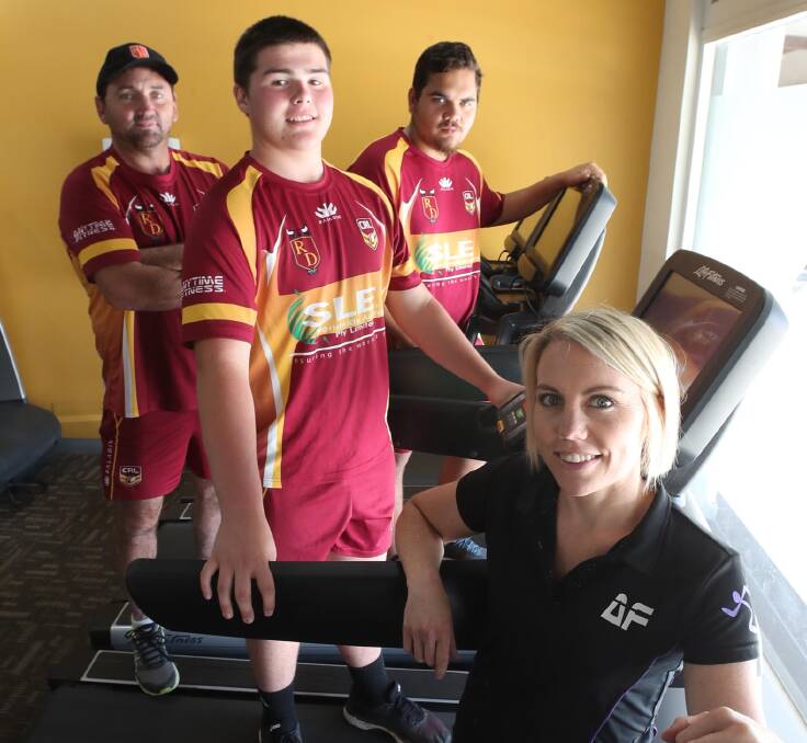 READY, SET: Riverina's Andrew Johns Cup coach Troy Ryan with player Will Roworth, Laurie Daley Cup team member Cameron Lyons and Anytime Fitness club manager Kelly Rands ahead of the first round of the season. Picture: Les Smith