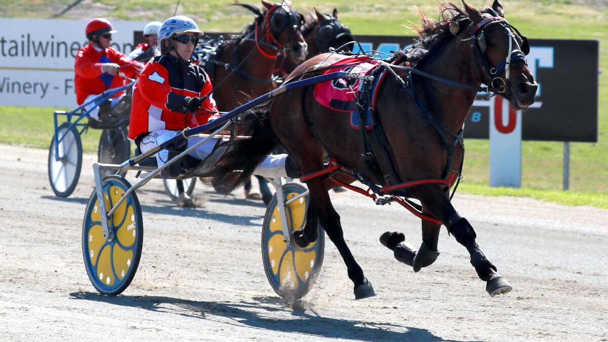 Irvine races away from his rivals to bring up his first win for Amy Day at Riverina Paceway on Friday.