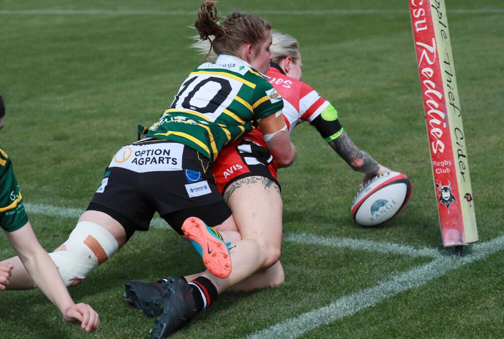 TRY TIME: Georgie Roberts stretches out to score in CSU's 39-20 win over Ag College on Saturday to send them through to the grand final. Picture: Les Smith