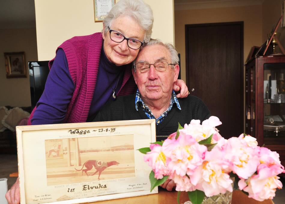 SPECIAL MEMORY: Barbara and Kevin Oakman look back at Elvuka winning the first greyhound race at the Wagga Showground in 1975. 