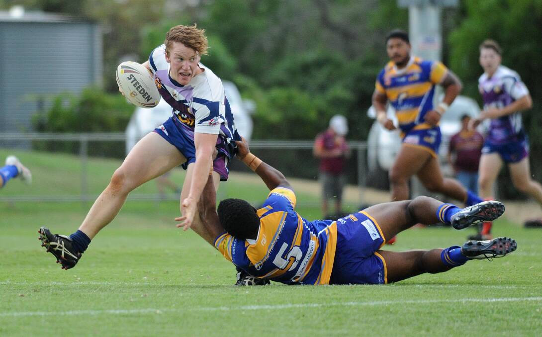 COMING BACK: Southcity's Luke McBeath tries to shrug out of a tackle at last year's West Wyalong Knockout. The Bulls are one of the few Group Nine sides confirmed to go back this year.