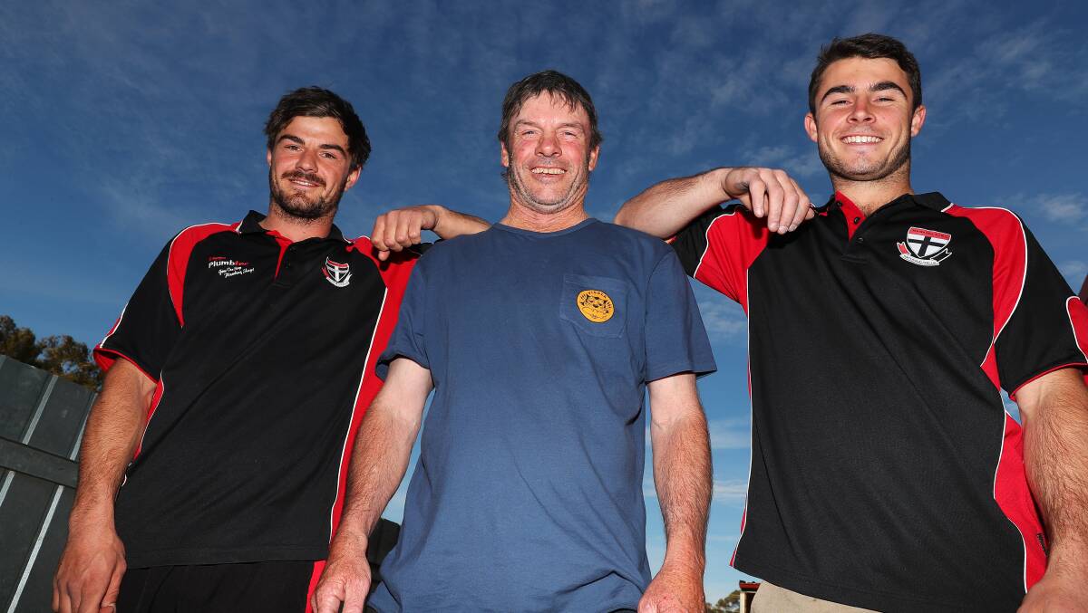 ALL IN THE FAMILY: Brothers Cayden (left) and Jed Winter (right) are out to join their father 'Bunge' as North Wagga premiership players on Saturday. Picture: Emma Hillier