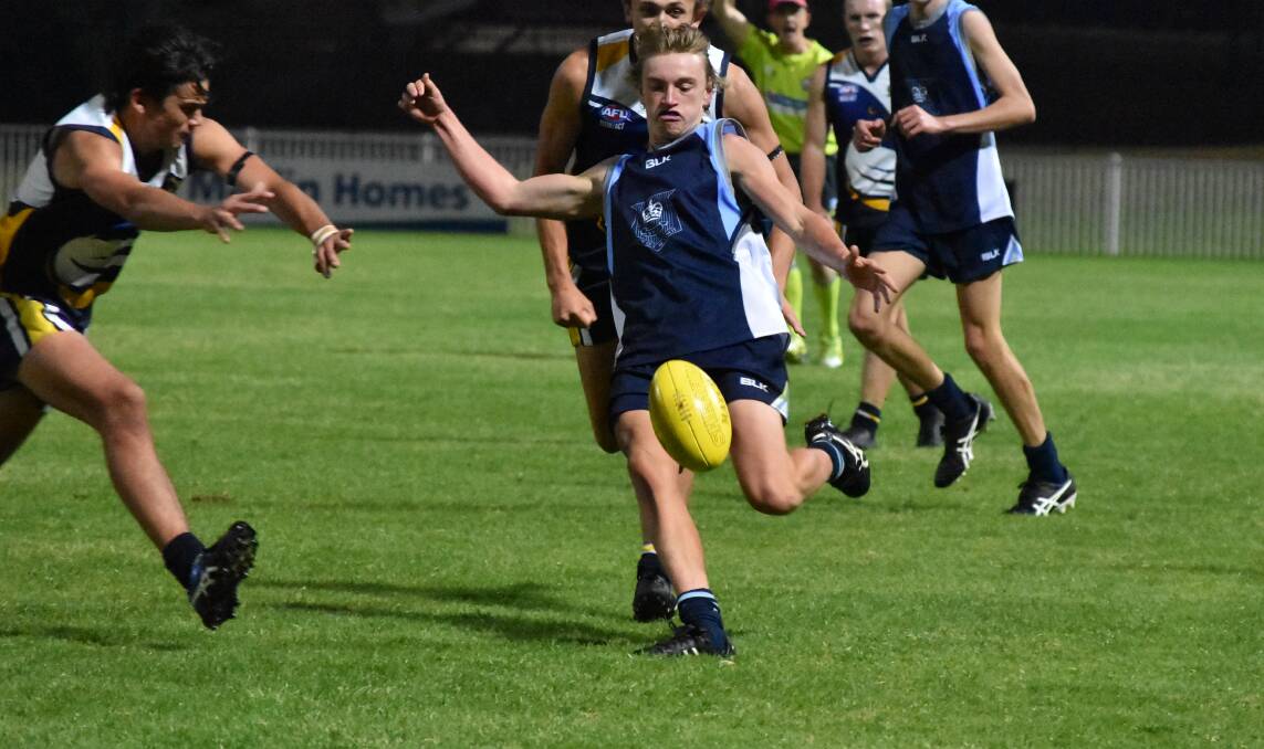 ON THE RUN: Sam McGowan kicks ahead for Wagga High as a draw with 
Kooringal High was enough to progress through to the grand final. Picture: Courtney Rees.