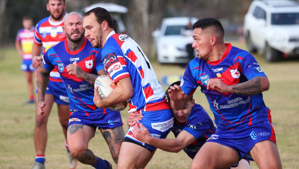 QUICK CHANGE: Tyler Cornish tries to break out of the Kangaroos defence in Young's come-from-behind win at Laurie Daley Oval on Sunday. Picture: Emma Hillier