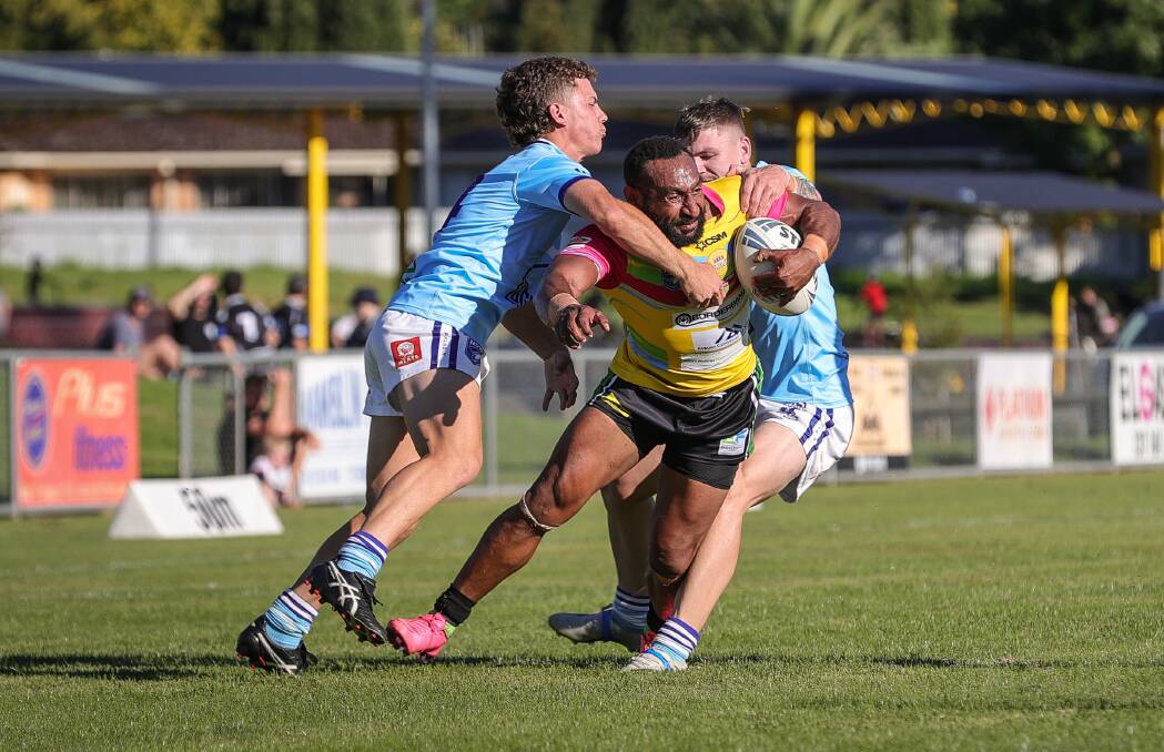 GOING NOWHERE: Mal Aitken and Brayden Draber work to wrap up Jackins Olam in Tumut's win over Albury at Greenfield Park on Sunday. Picture: James Wiltshire