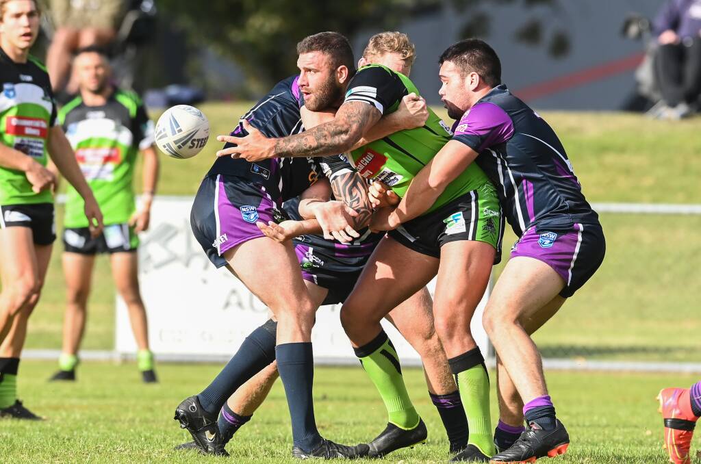 GOOD WIN: Nathan Darby gets an offload away during Albury's win over Southcity on Saturday. Picture: The Border Mail