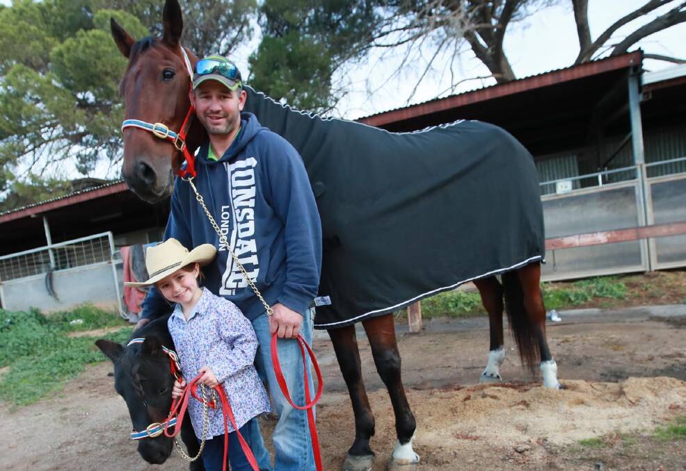 Brett Hogan and Roll Out, daughter Pippa, 6, and her pony Turbo ahead of a Regional Championships campaign.