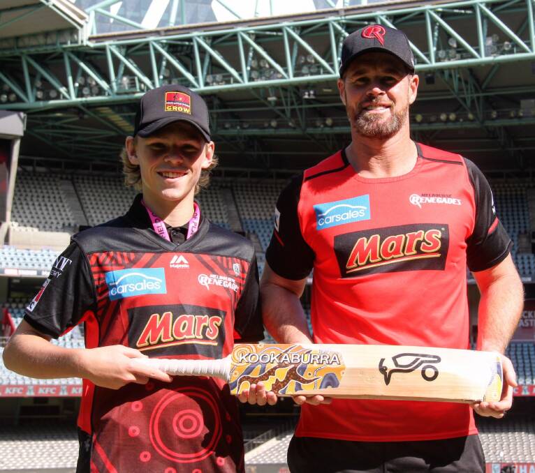 MEMORABLE MOMENT: Adam Irons and Melbourne Renegades star Dan Christian with the bat Irons designed. Picture: Kookaburra