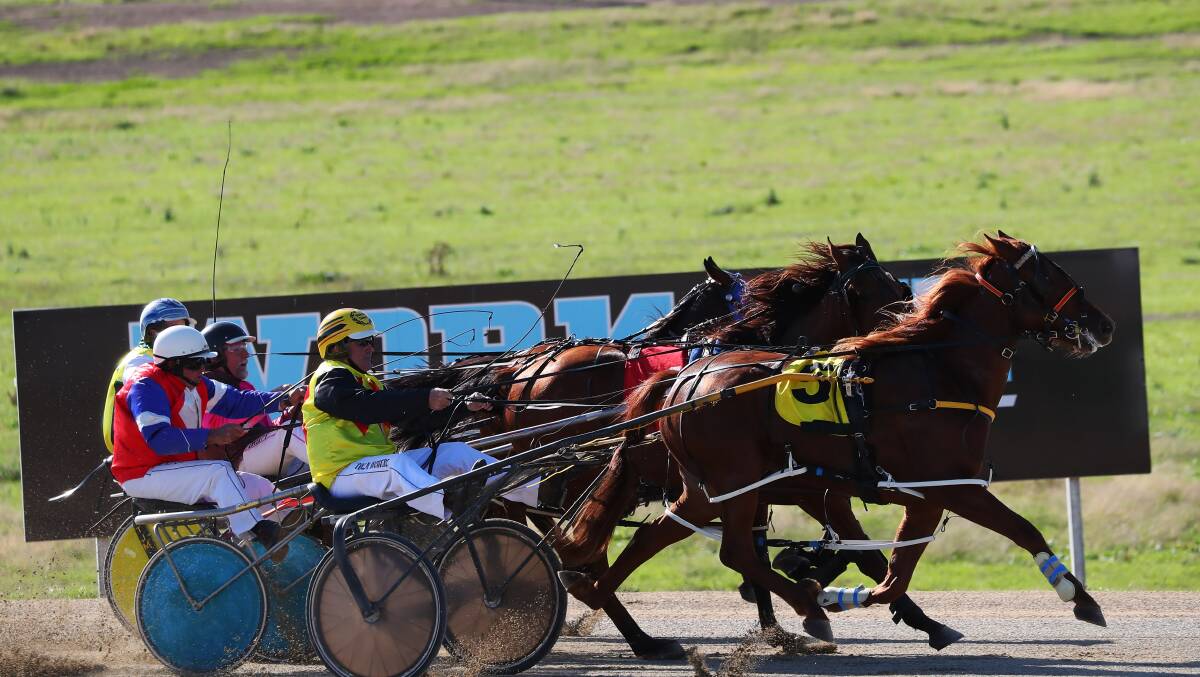 Menames Needy (centre) pushes through to win his last start at Riverina Paceway in April.
