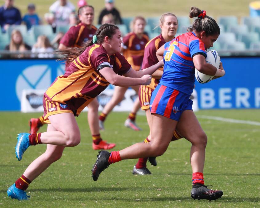 Tess Staines tries to make a tackle on Saturday.