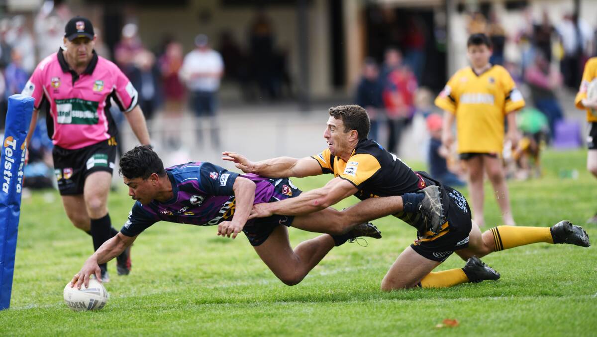 TRY TIME: Steven Tracey dives over for the first of two crucial tries in the corner in Southcity's extra-time win over Gundagai at Anzac Park.