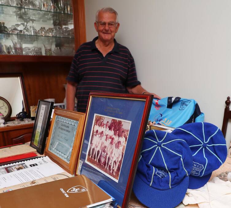 HISTORY ON DISPLAY: South Wagga stalwart Max Knight with some of the memorabilia collected during his long association with the Blues. Pictures: Emma Hillier