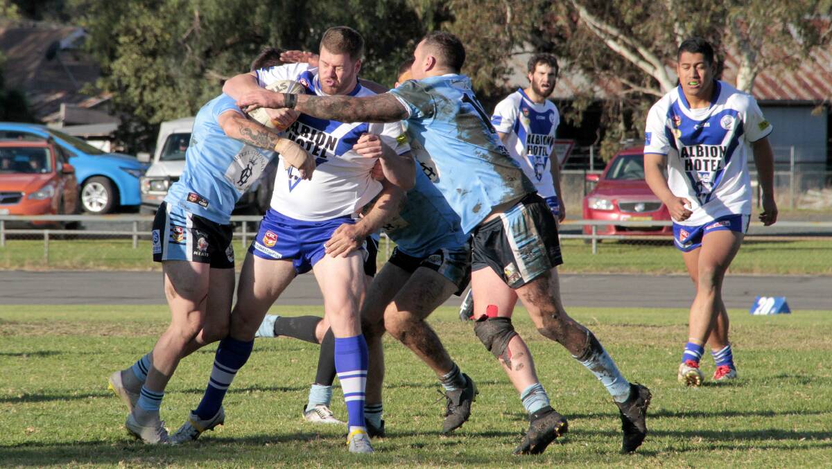 Josh Black brings the ball forward for Cootamundra in the game with Tumut that has sparked a war of words over the future of the competition.