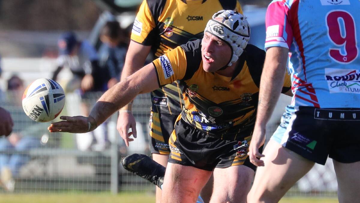 SMART WORK: Gundagai hooker James Luff flicks out a pass during their tight win over Tumut at Twickenham on Saturday. Picture: Les Smith
