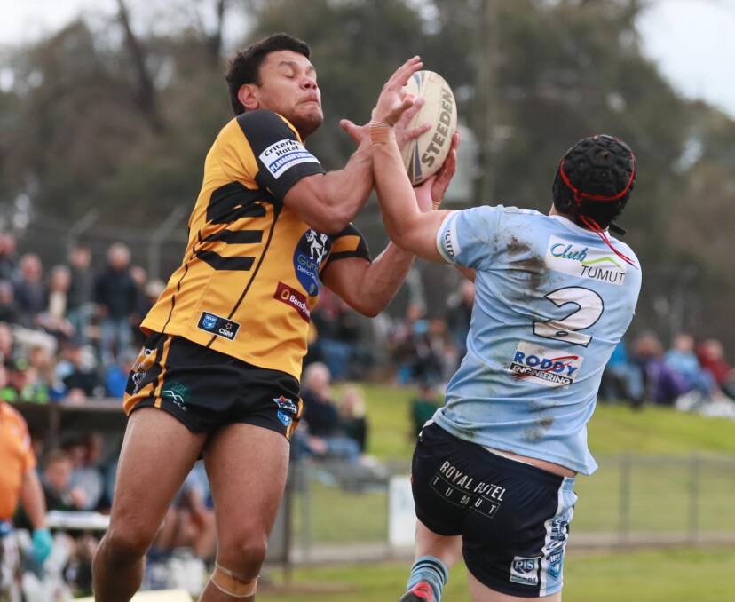 FLYING HIGH: Jack Lyons and Connor Massen
go up for a kick during Gundagai's 8-6 win
over Tumut at Twickenham on Sunday to book
their place in the Group Nine grand final. Picture: Les Smith