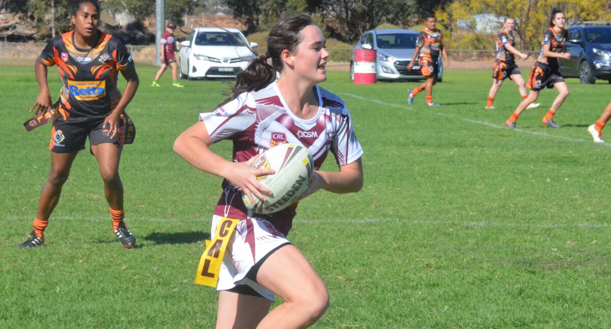 Tess Staines scored a try in the women's national championships.