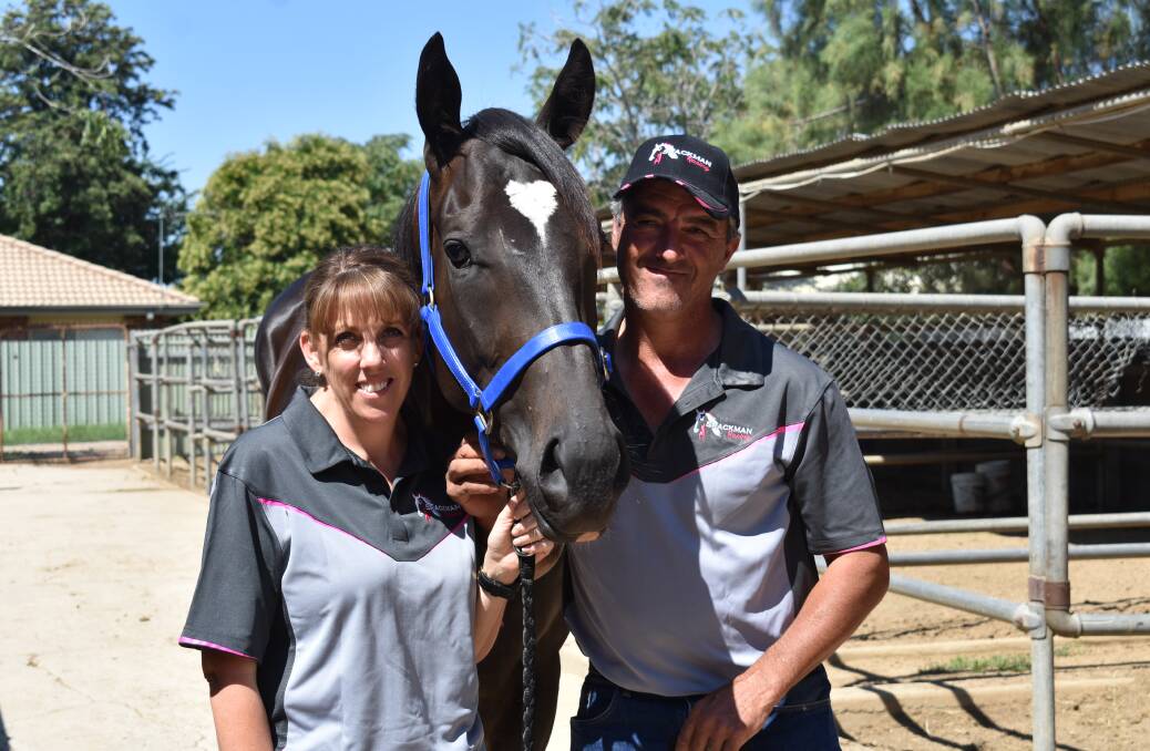 LOFTY AMBITION: Wagga trainer Scott Spackman will line up Rocket Tiger,
pictured with his wife Donna, in the Silver Slipper
at Rosehill on Saturday. Picture: Courtney Rees