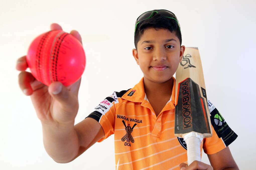 SPECIAL MOMENT: Kaustav 'Dodo' Chakraborti, who bowls in his sunglasses, took a hat-trick in the under 12s for Wagga RSL Gold on Saturday. Picture: Les Smith