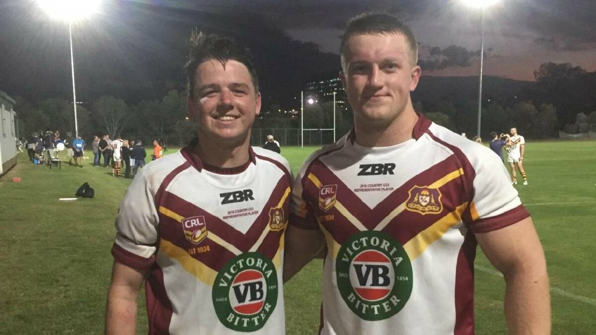 Temora captain-coach Sam Elwin, pictured with Tumut forward Zac Masters, is hoping to lure a number of players from Papua New Guinea to the club after being part of the Country under 23s tour there earlier this month.