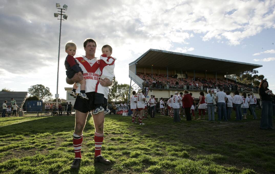 Steve Reardon with his kids Billy, 4 and Jed, 18 months after winning the 2006 grand final at Weissel Oval.