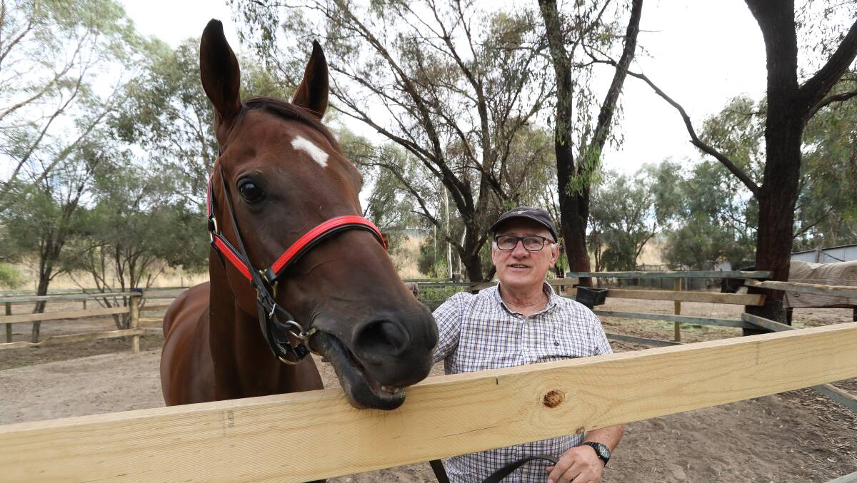 LOCAL SHOT: Albury trainer John Whitelaw, pictured with Daisy Doutes, is looking to make it back-to-back wins with Rosie's Revenge on his hometrack on Tuesday. 