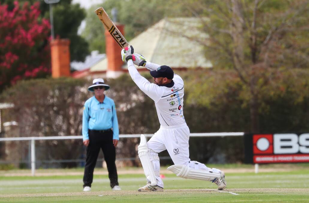 BIG KNOCK: Jeremy Rowe sends the ball flying on his way to 156 in South Wagga's grand final loss.
