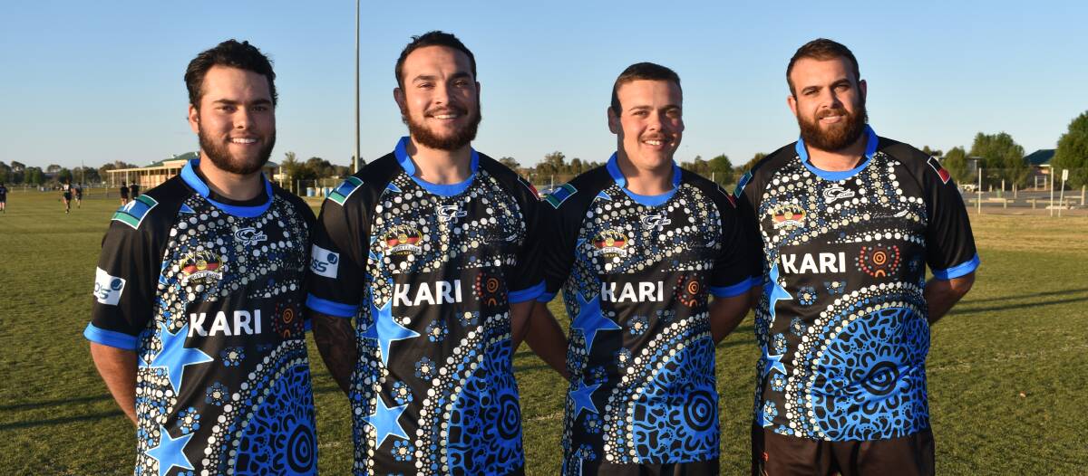 READY TO ROCK: Showing off Dindima's new jumpers for the Koori Knockout this weekend is Tyson and Dylan McLachlan and Makele and Clifford Morris. They play Toolmelah Tigers on Saturday. Picture: Courtney Rees