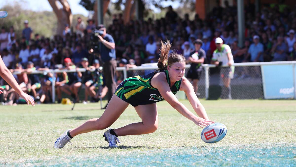 TRIPLE TREAT: Madison Haggar goes over for one of her three tries in the 19-2 win by Riverina Vipers in the under 18s Junior State Cup conference final on Sunday. Picture: Emma Hillier